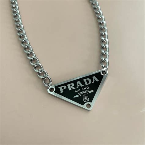 Prada triangle pendant